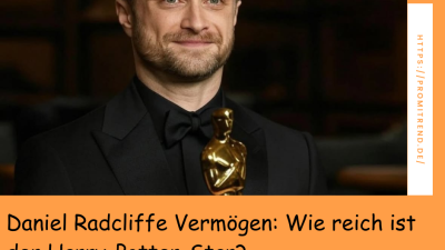 Eine Person im schwarzen Anzug hält eine goldene Trophäe. Der Text auf dem Bild fragt nach dem Vermögen des Harry-Potter-Stars Daniel Radcliffe.