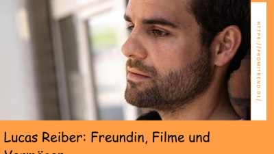 Ein Mann mit braunen Haaren steht vor einem Fenster. Im Vordergrund ist eine Suchleiste mit dem Text "Lucas Filme" zu sehen.