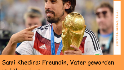 Ein Fußballspieler in einem weißen Trikot mit roten und schwarzen Streifen hält den FIFA-Weltmeisterschaftspokal und trägt eine Goldmedaille um den Hals. Im Vordergrund ist eine Suchleiste mit dem Text "Sami Khedira: Freundin, Vater geworden und Vermögen" und der Website "promitrend.de" zu sehen.